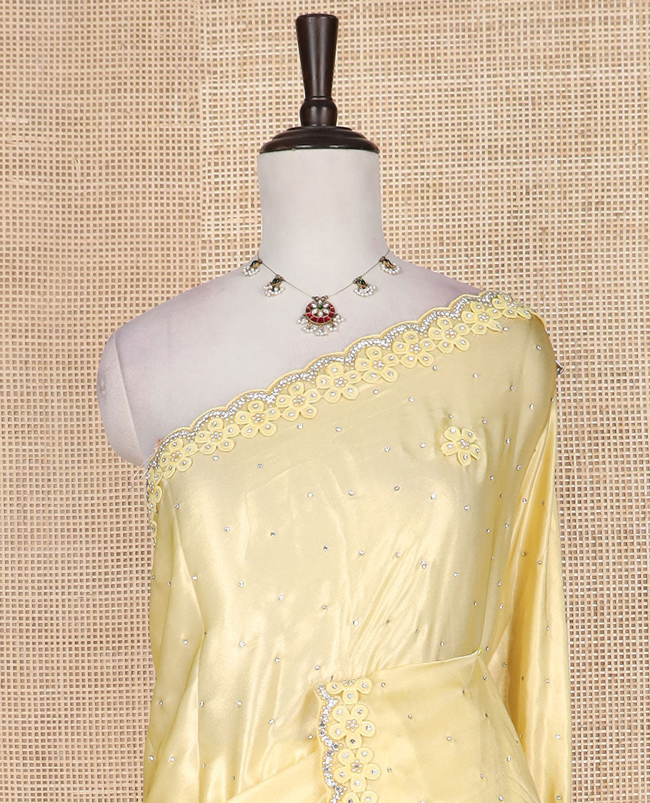 Yellow flower buttas embroidered with stone work designer saree, flower buttas embroidered with stone work scallop border