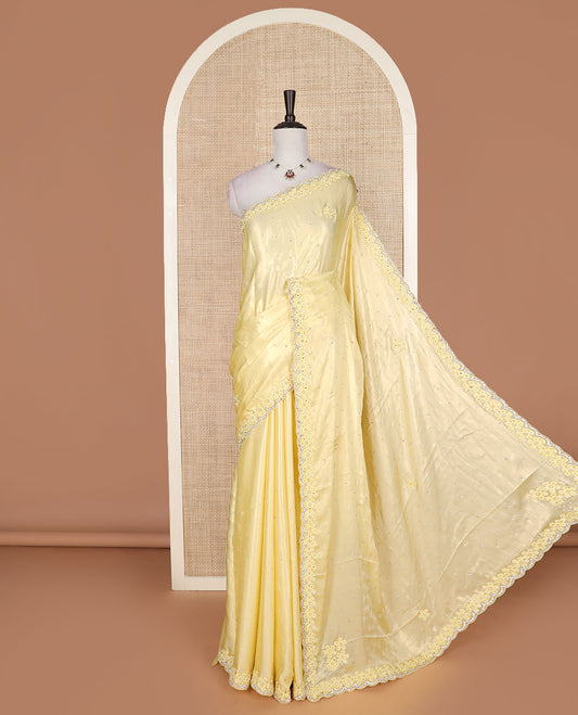 Yellow flower buttas embroidered with stone work designer saree, flower buttas embroidered with stone work scallop border