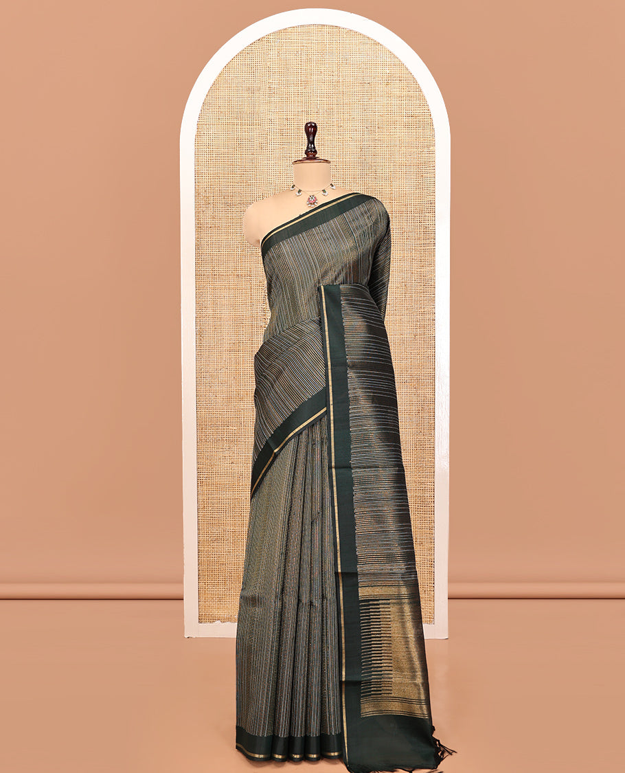 Green Dupion Silk Saree, Embellished with Dotted Stripes, a Zari Border, Gleaming Striped Pallu, and a Matching Blouse