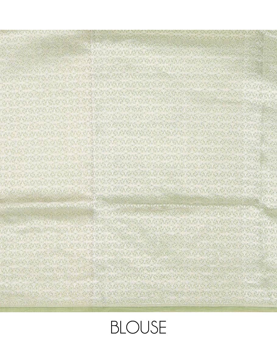 Purple Raw Mango Silk Saree Highlighted by Floral Buttas, Featuring a Contrast Traditional Zari Design Border, a Pallu Elevated with Chevron Stripes, Paired with a Contrast Brocade Blouse