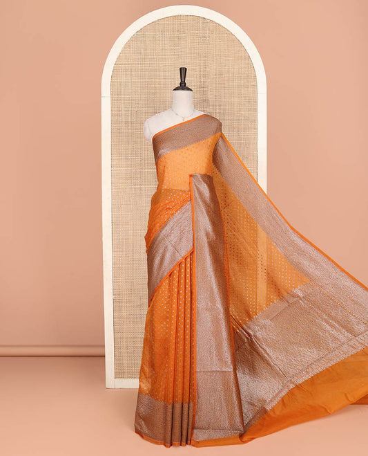 Orange Fancy Georgette Saree Decked Up with Zari Buttas, Hazily Zari Woven Border of Traditional Designs, Hazily Woven Pallu of Intricate Designs, and Paired with a Matching Blouse