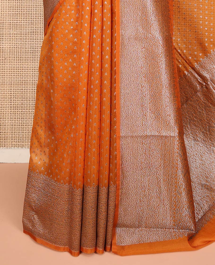 Orange Fancy Georgette Saree Decked Up with Zari Buttas, Hazily Zari Woven Border of Traditional Designs, Hazily Woven Pallu of Intricate Designs, and Paired with a Matching Blouse