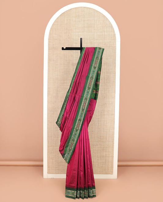 Magenta Plain Ikkat Silk Saree with a Contrast Green Border Complemented by a Hazy Ikkat Weave, Featuring a Pallu Flanked by Stripes and Ikkat Texture