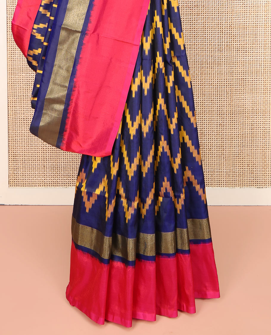 Blue Ikkat Silk Saree, Delicately Woven with Chevron Designs All Over Its Body, Complemented by a Contrast Border, Pallu Steeped with Temple Designs, and Paired with a Contrast Blouse