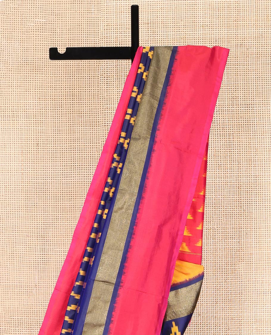 Blue Ikkat Silk Saree, Delicately Woven with Chevron Designs All Over Its Body, Complemented by a Contrast Border, Pallu Steeped with Temple Designs, and Paired with a Contrast Blouse