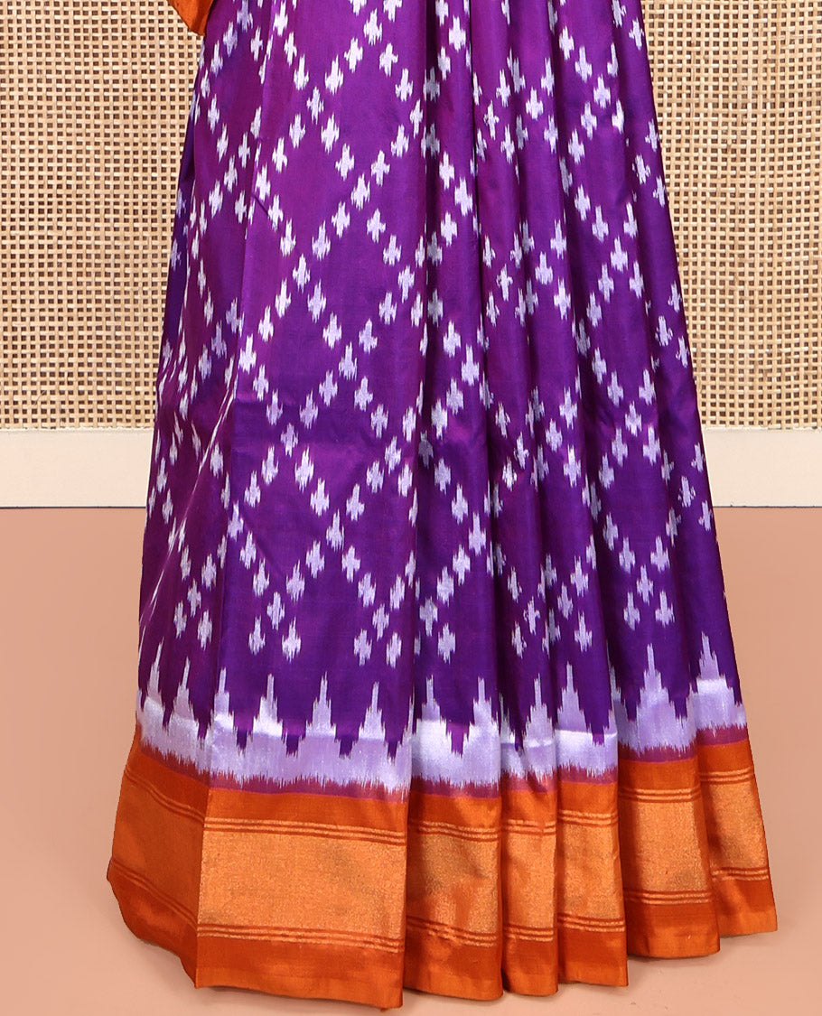 Purple Pochampally Ikat Silk Saree, Elevated with Ikat Jaal Designs on Its Body, Complemented by a Contrast Temple Border, Pallu of Ogee Pattern in Ikkat Weave, and Paired with a Contrast Blouse