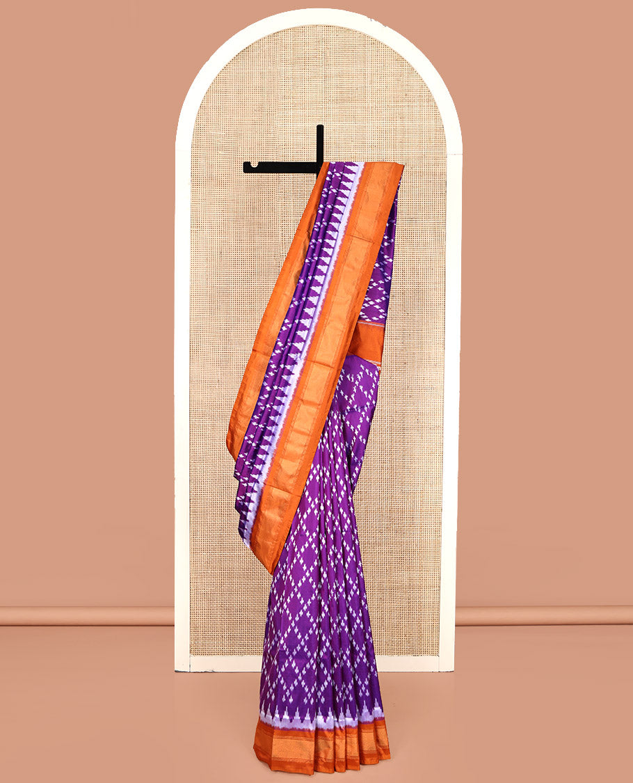 Purple Pochampally Ikat Silk Saree, Elevated with Ikat Jaal Designs on Its Body, Complemented by a Contrast Temple Border, Pallu of Ogee Pattern in Ikkat Weave, and Paired with a Contrast Blouse