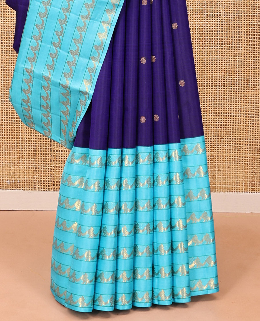 Blue Kanchipuram Designer Silk Saree, Opulently Embellished with Zari Buttas, a Contrast Border Steeped with Kili Designs, Zari-Woven Pallu, and a Contrast Blouse
