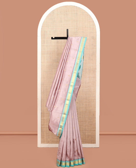 Pink Kanchipuram Silk Saree, Finely Crafted with Zari Buttas, a Contrast One-Sided Border of Jaal Design, Zari Design Pallu, and No Blouse
