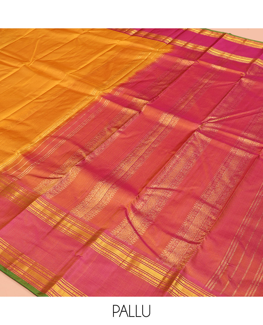 Orange Plain Kanchipuram Silk Saree, Complemented by Contrast Rettai Pettu Border of Rekku, Rudraksham, and Vanki Designs, Pallu of Traditional Zari Designs, and Paired with a Contrast Blouse