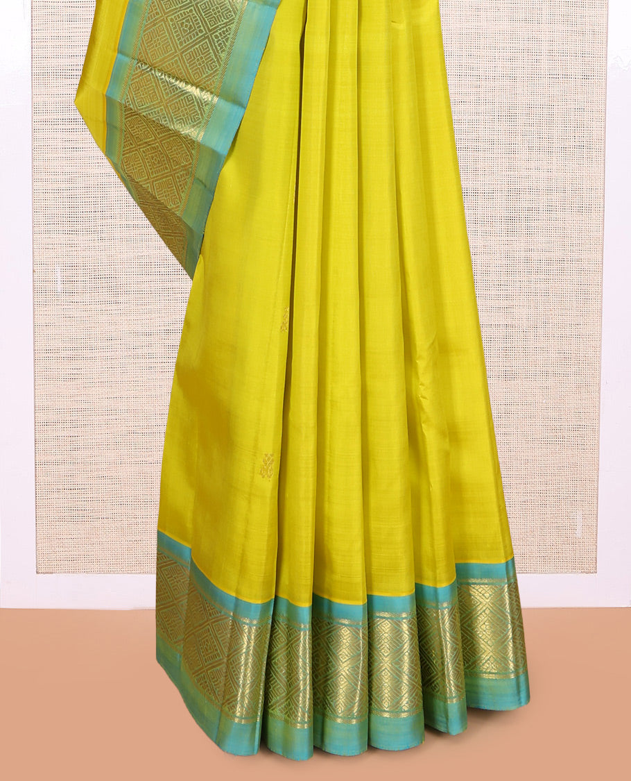 Green Kanchipuram Silk Saree, Woven with Zari Buttas, a Contrast Jaal Design One-sided Border, Zari Woven Pallu, and No Blouse