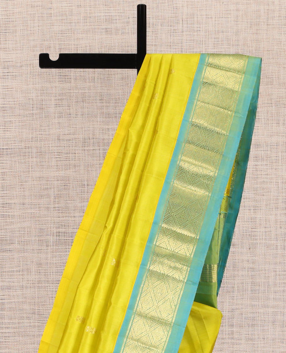 Green Kanchipuram Silk Saree, Woven with Zari Buttas, a Contrast Jaal Design One-sided Border, Zari Woven Pallu, and No Blouse