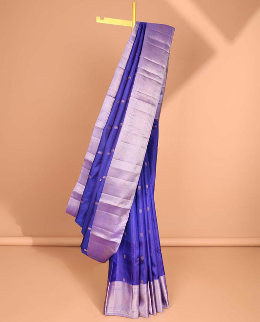 Dark blue buttas kancheepuram silk saree with contrast border of thilakam mokku, muthu, banaras, paun design & zari design pallu
