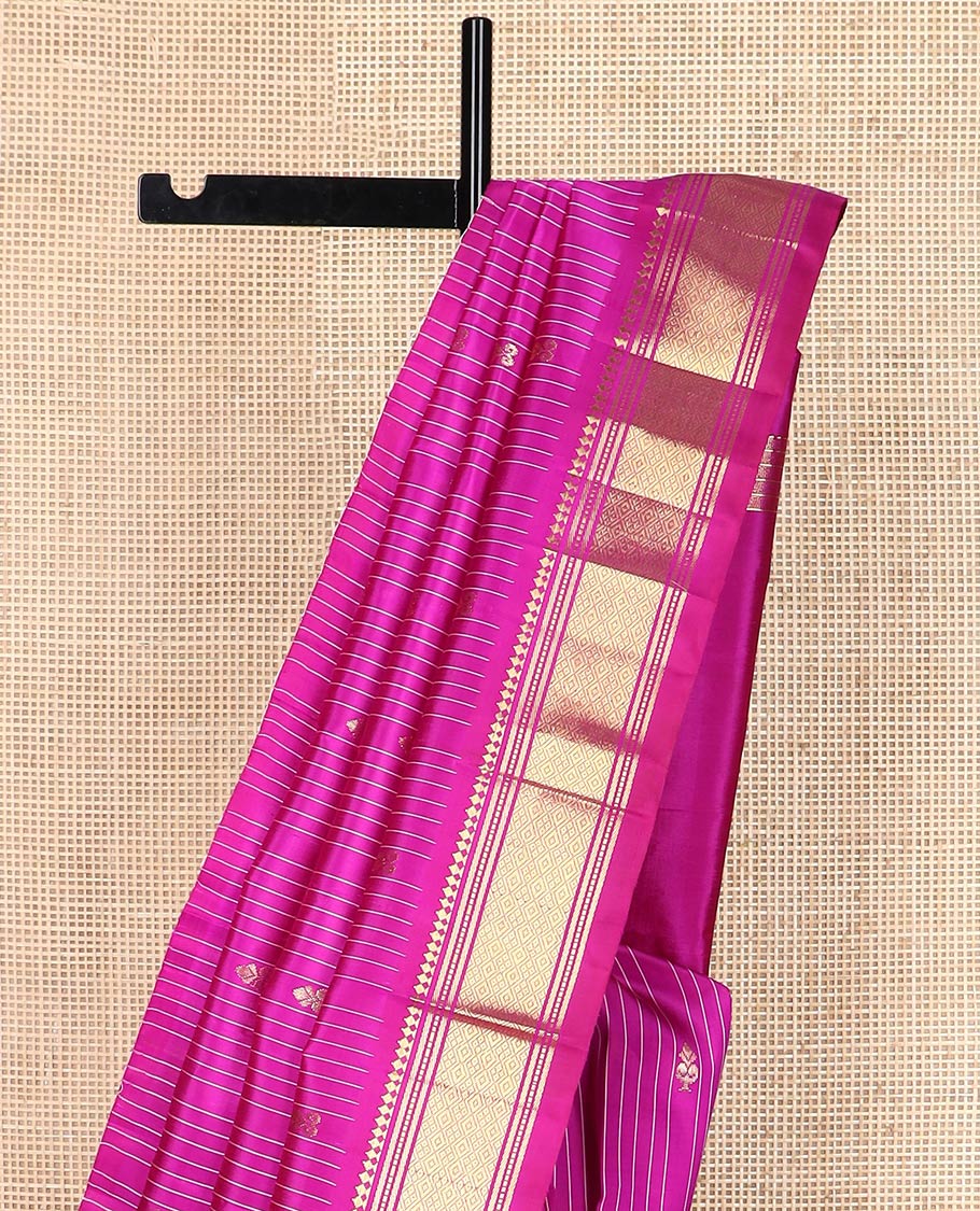 Rani pink stripes & buttas Kanchipuram silk saree, one-sided border of panner sombu,banaras & mayil kann & zari design pallu
