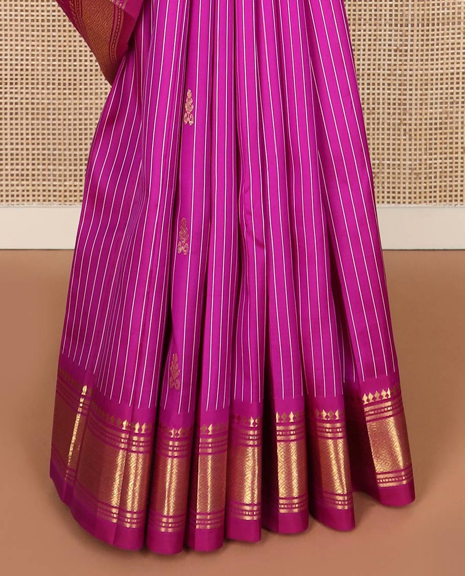 Rani pink stripes & buttas Kanchipuram silk saree, one-sided border of panner sombu,banaras & mayil kann & zari design pallu