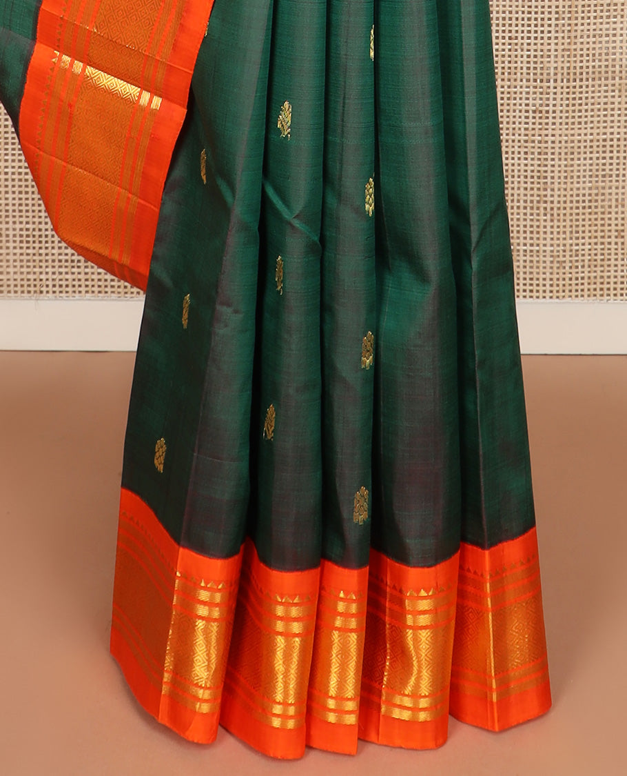Green zari buttas Kanchipuram silk saree, contrast one-sided korvai border of rekku, banaras, and jaal design, and zari design pallu