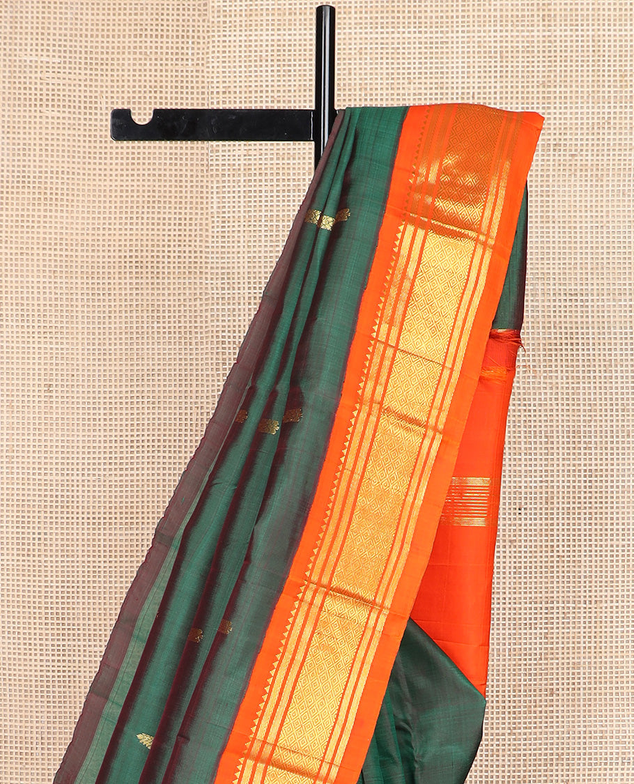 Green zari buttas Kanchipuram silk saree, contrast one-sided korvai border of rekku, banaras, and jaal design, and zari design pallu