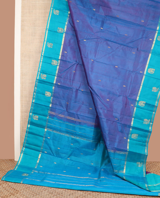 Blue zari buttas Kanchipuram silk saree, contrast mayil yaanai motifs woven border, and zari design pallu