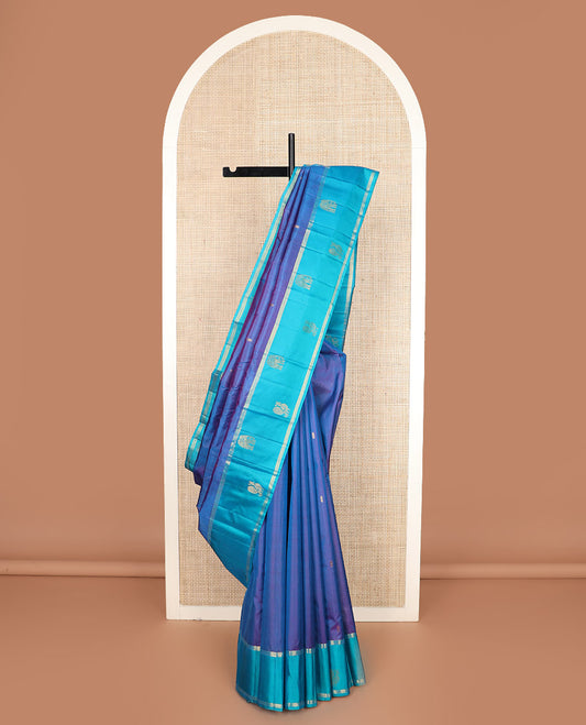 Blue zari buttas Kanchipuram silk saree, contrast mayil yaanai motifs woven border, and zari design pallu