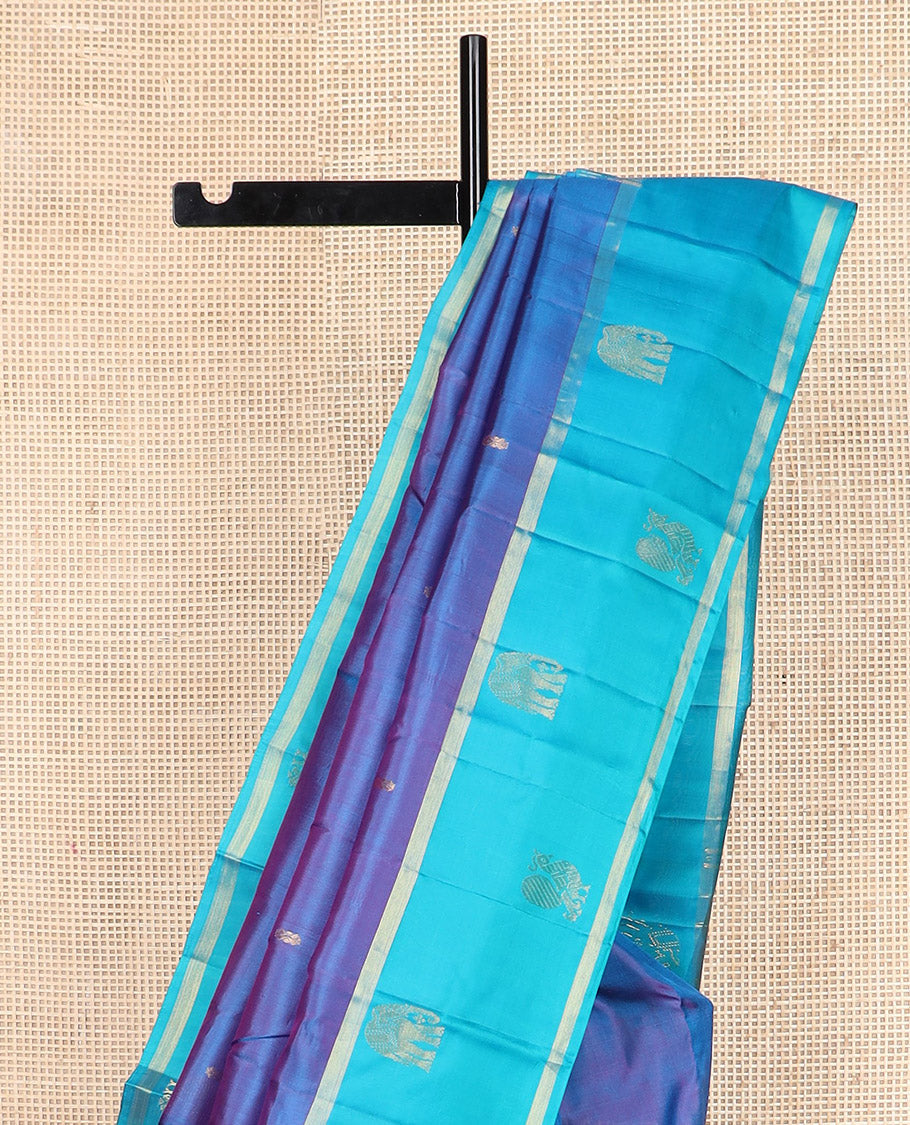Blue zari buttas Kanchipuram silk saree, contrast mayil yaanai motifs woven border, and zari design pallu