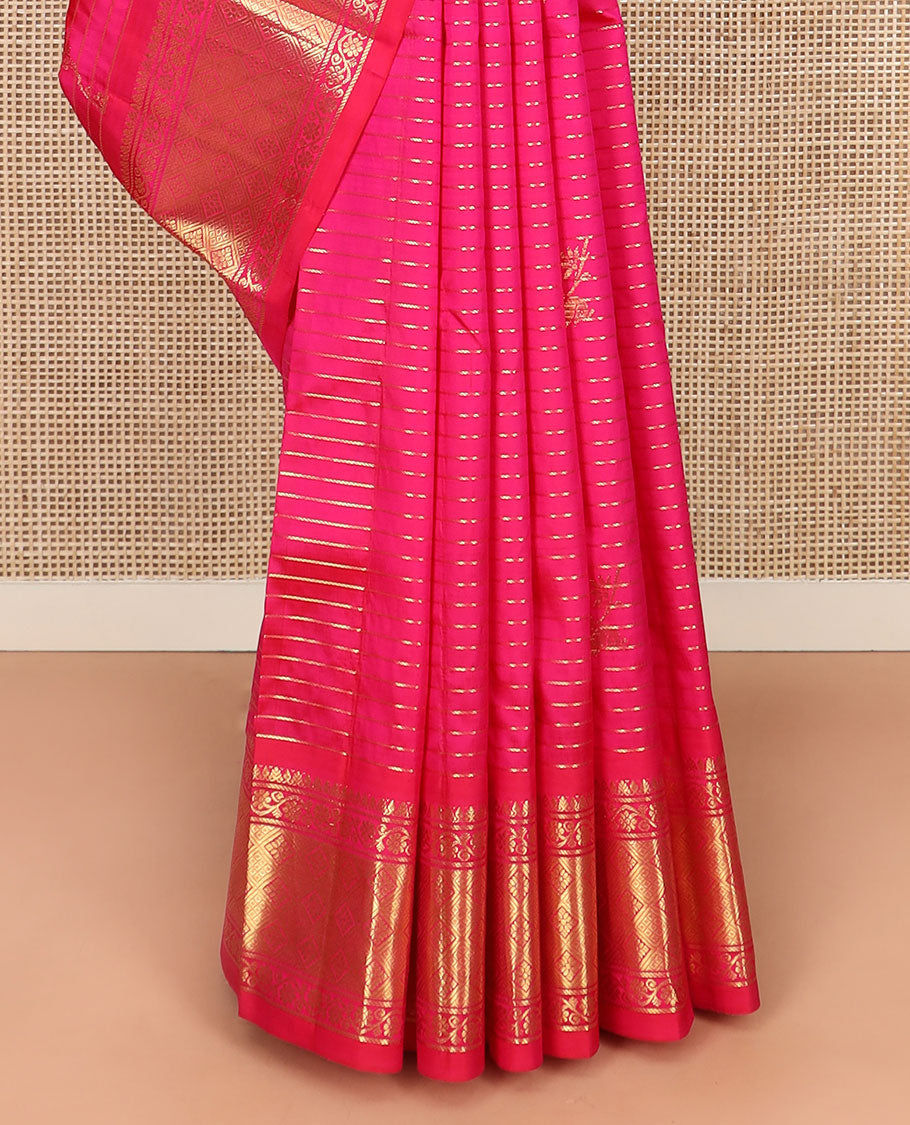 Rani Pink Kanchipuram Silk Saree Graced with Mayil Buttas and Zari Stripes All Over Its Body, Complemented by Contrast One-Sided Border of Kodi Visiry and Jaal Designs, Grandly Woven Pallu of Geometric Patterns, and Comes Without a Blouse