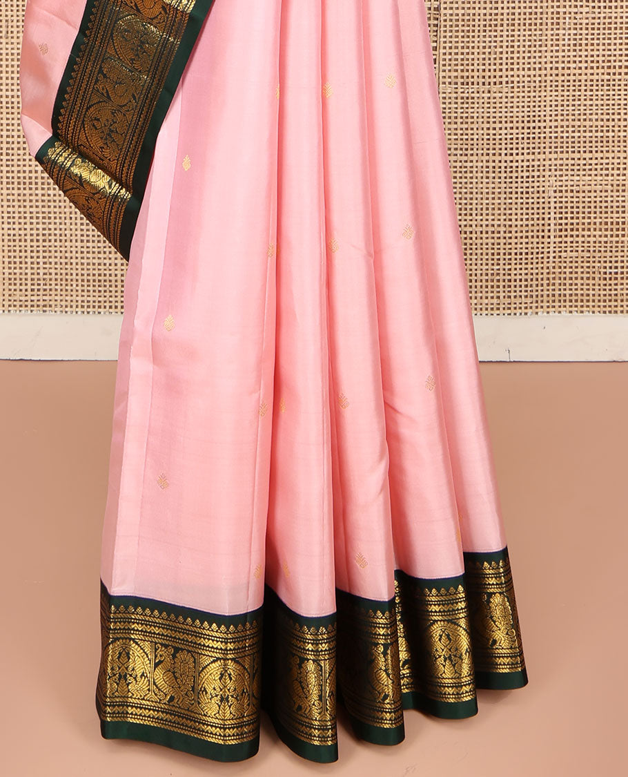 Pink Kanchipuram Silk Saree, Subtly Sparkled with Buttas on Its Body, Complemented by a Contrast Border of Thilakam, Banaras, Muthu, Neli, and Mayil Designs, Grandly Jaal Woven Pallu, and Paired with a Contrast Blouse