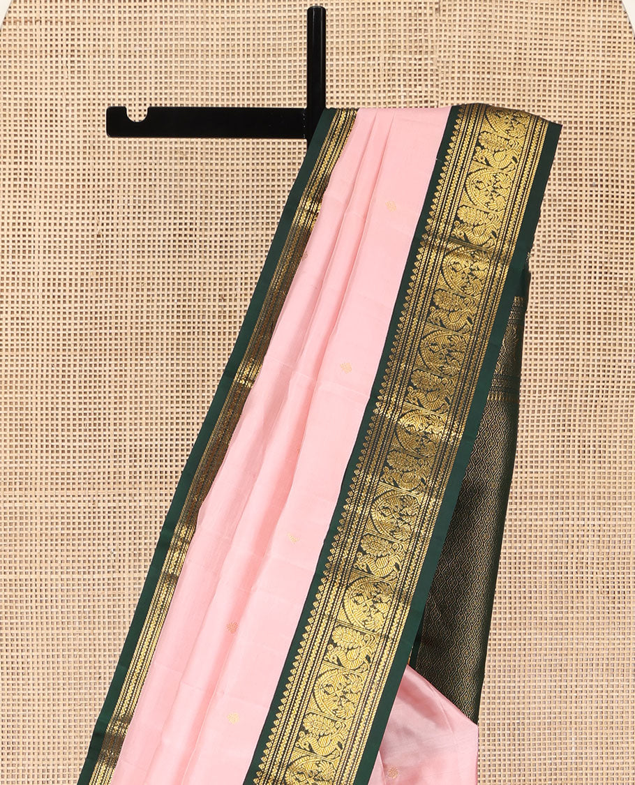 Pink Kanchipuram Silk Saree, Subtly Sparkled with Buttas on Its Body, Complemented by a Contrast Border of Thilakam, Banaras, Muthu, Neli, and Mayil Designs, Grandly Jaal Woven Pallu, and Paired with a Contrast Blouse