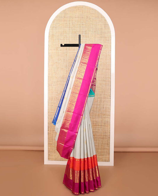 White buttas buttas kancheepuram silk saree with contrast ganga jamuna, korvai border of intricate zari design & floral design pallu