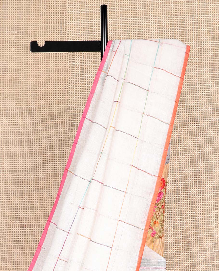 Borderless cream checked linen cotton saree, contrast pallu of colorful floral motifs