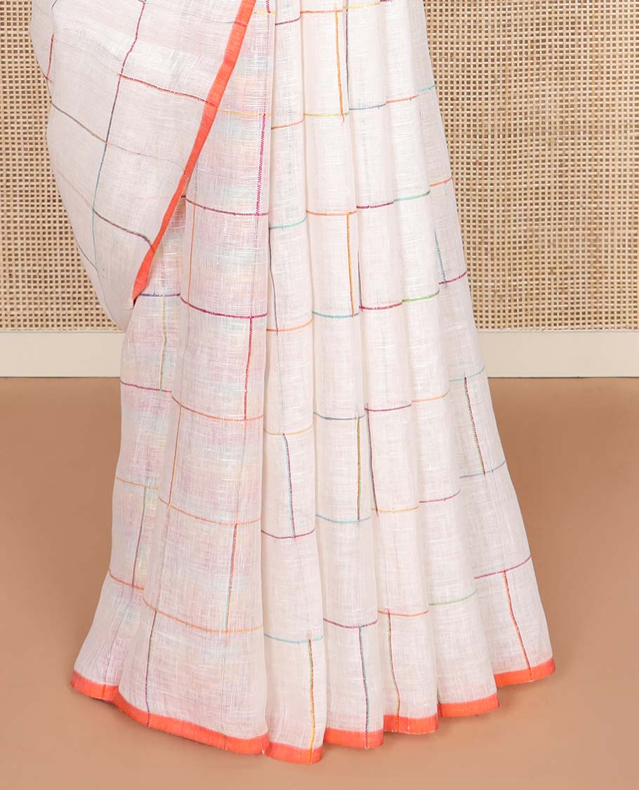 Borderless cream checked linen cotton saree, contrast pallu of colorful floral motifs