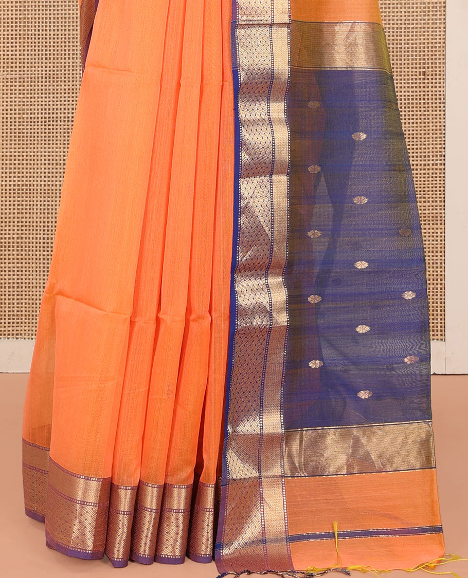 Orange Maheshwari Cotton Saree, Delicately Woven with Thread Buttas All Over Its Body, Complemented by Contrast Traditional Zari Design Border, Pallu Steeped with Zari Buttas, and Paired with a Contrast Blouse