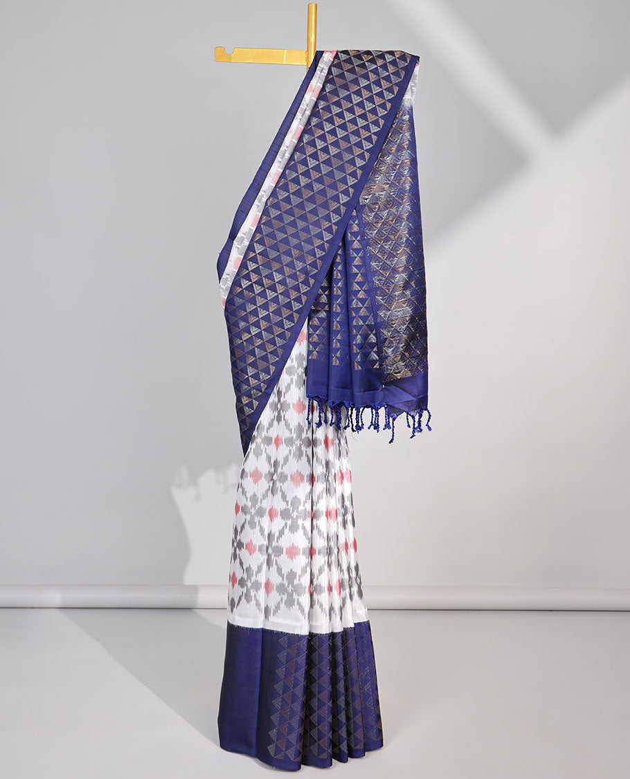 White ikkat style floral design soft silk saree with contrast zari border & ara maadam zari design pallu