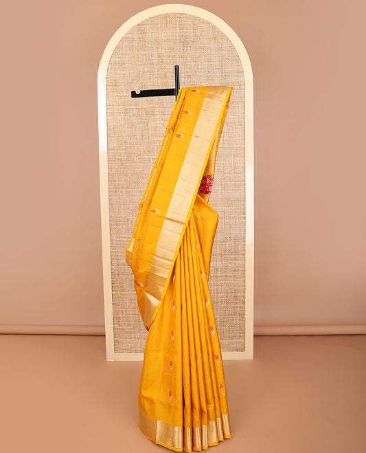 Orange floral motifs mayuri soft silk saree with contrast zari border & striped, floral design pallu