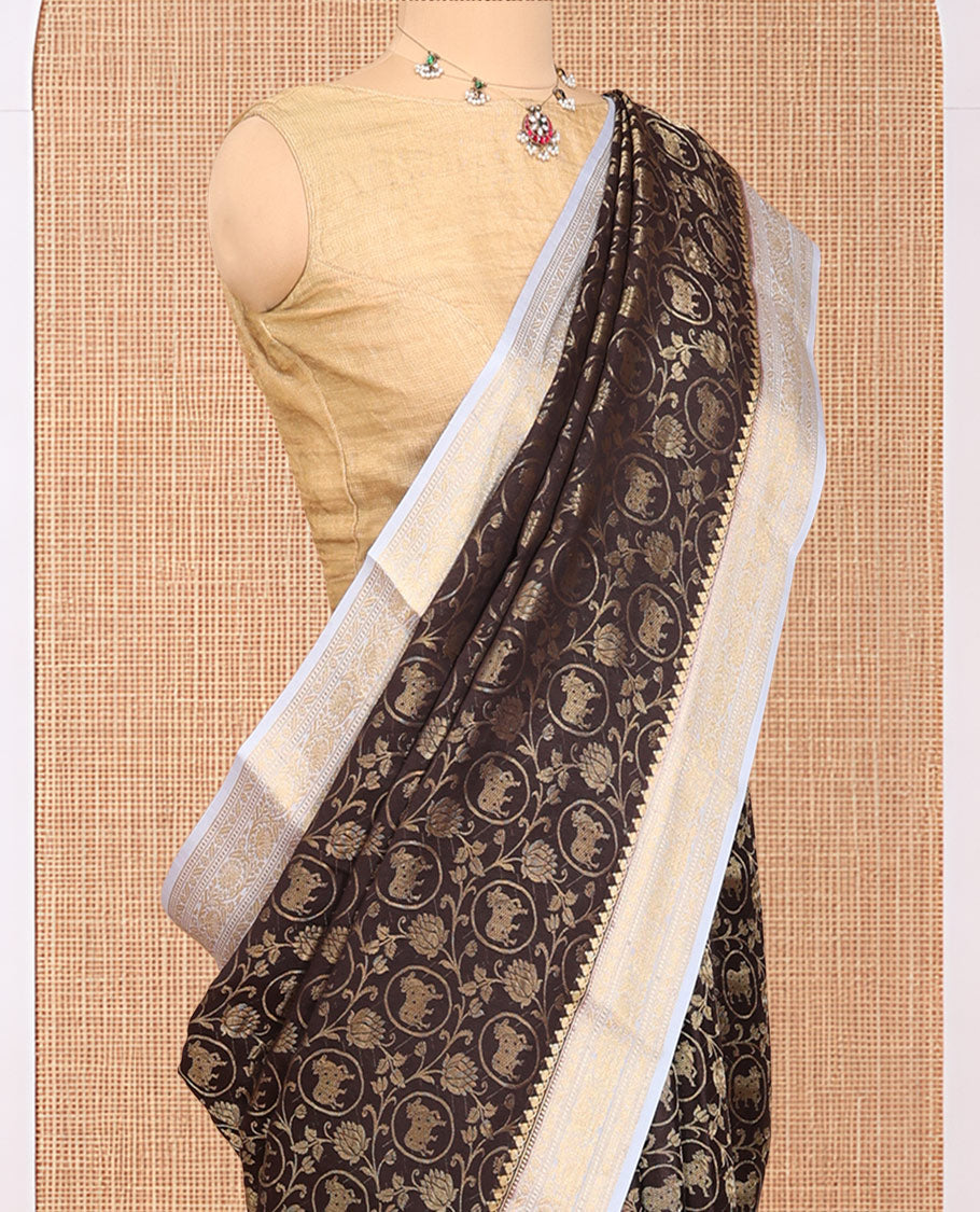 Brown Mysore Silk Saree, Adorned with Pichwai Cow and Lotus Vine, Complemented by a Contrast Traditional Zari Border, Intricate Pallu, and a Contrast Blouse