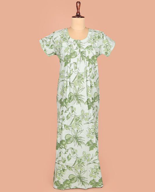 Pale Green Cotton Nighty Subtly Decked Up with Floral Patterns Print, Featuring Lace Work, Round Front Neck, and Half Sleeves