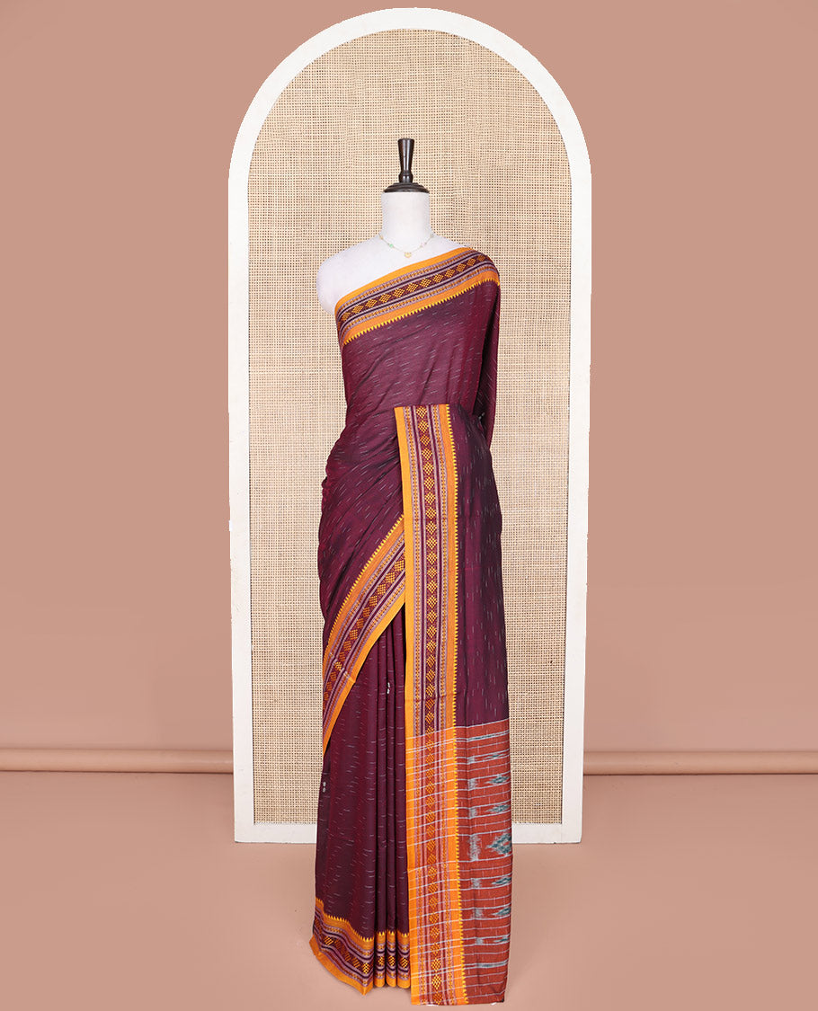 Wine Odisha Cotton Saree, Subtly Woven with Buttas All Over the Body, Complemented by a Contrast Temple Border of Geometric Thread Patterns, Pallu Depicts Geometric Patterns, and Paired with a Matching Blouse