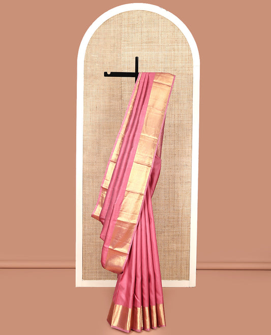 Pink Embossed Parampara Silk Saree, Highlighted by Zari Border of Thilakam and Vanki Designs, Pallu Steeped with Rudraksham Designs, and Paired with a Matching Blouse