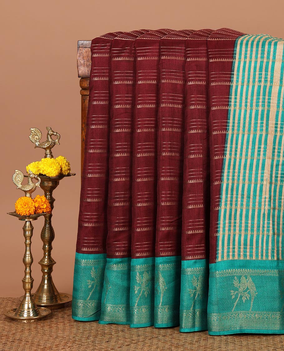 Wine golden zari striped dola silksaree, contrast parrot motif & traditional design border, temple pallu & zari design pallu