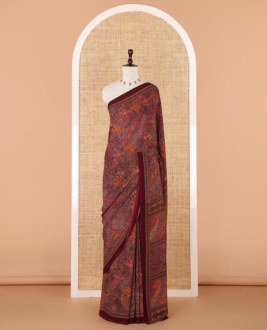 Maroon kaleidoscopic-colored checks mill-printed kimaya saree, contrast plain border & paisley & geometric printed pallu