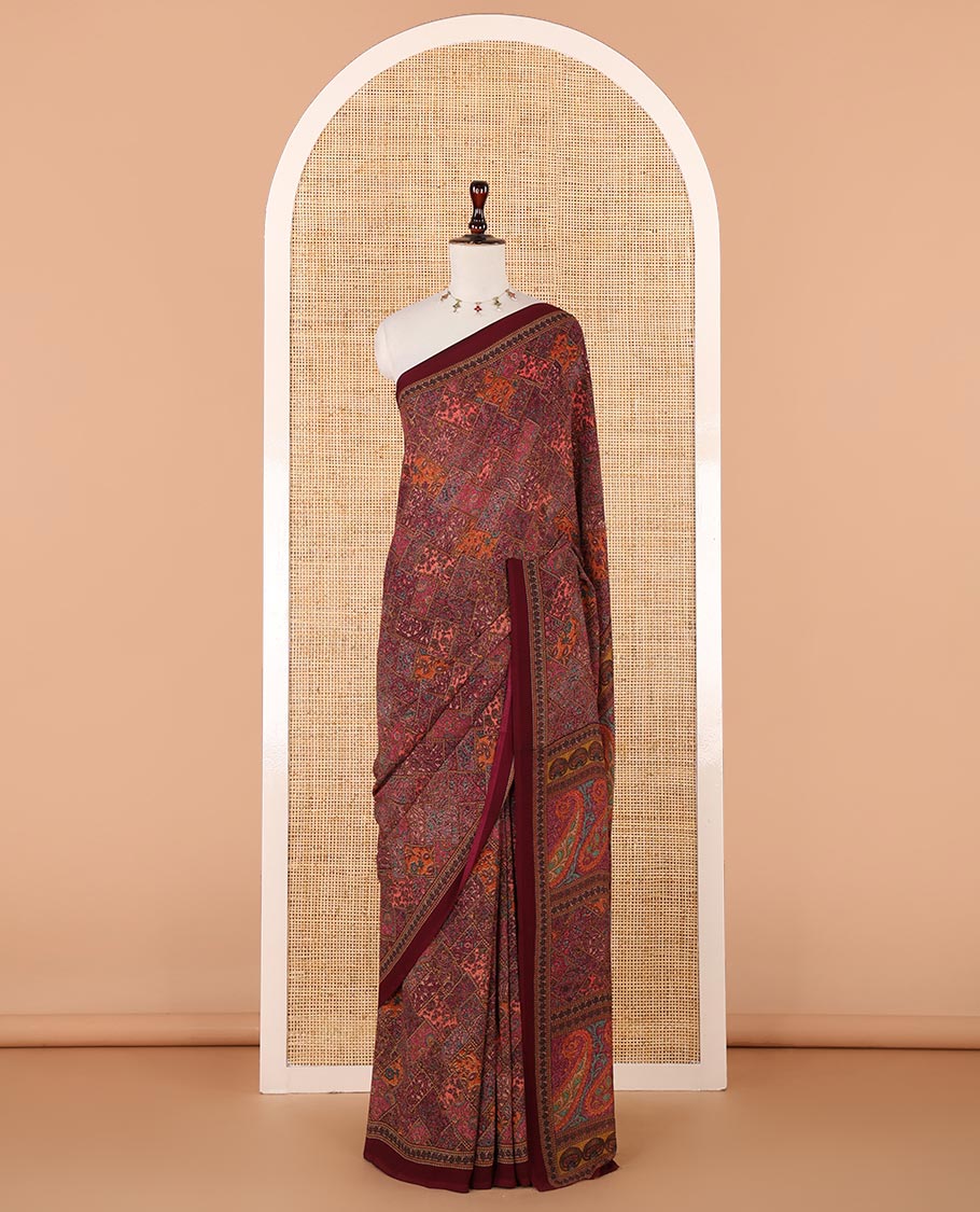 Maroon kaleidoscopic-colored checks mill-printed kimaya saree, contrast plain border & paisley & geometric printed pallu