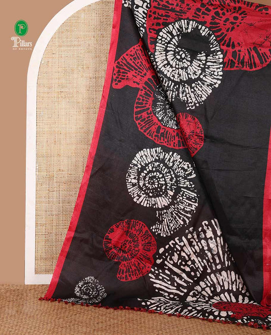 Black batik-style uniquely printed khadi cotton saree, contrast red piping plain border & printed pallu