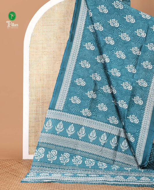 Blue floral printed litchi crushed saree, geometric printed border, floral-geometric printed pallu & triangle motif printed blouse
