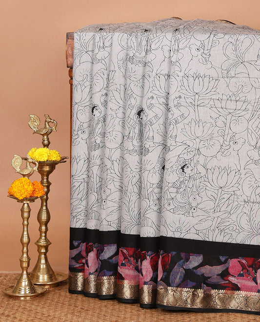 Grey kalamkari-style cow, lotus & human motifs printed Assam cotton saree, contrast floral print & zari paisley border & printed blouse