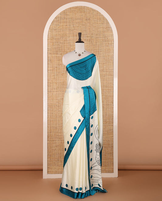 Cream printed semi-modal silk saree,  contrast blue border of kathakali motif enclosed semi-circle, kathakali printed pallu & printed blouse