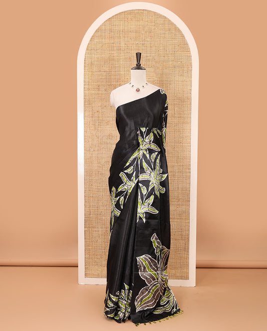 Black-base plain body khadi cotton saree with batik-style green-color floral printed border & pallu, line-type blouse