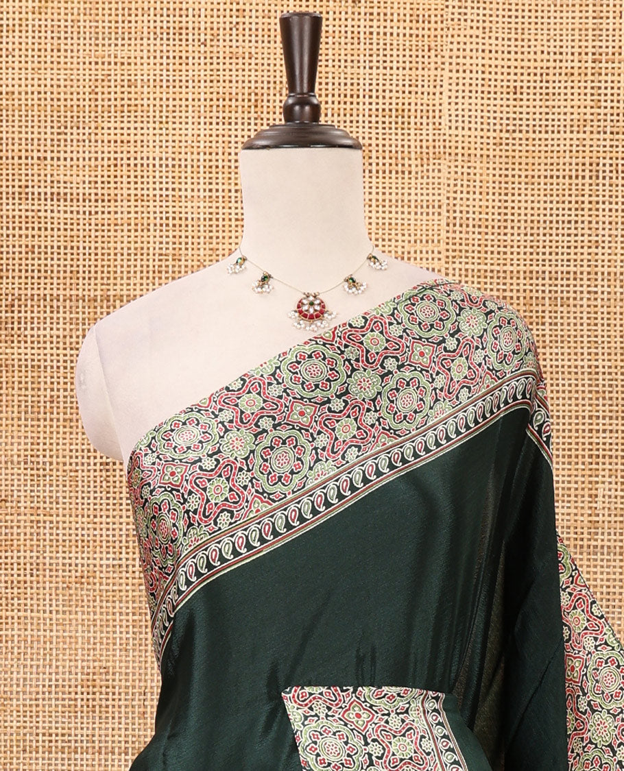 Green plain design Turkey crepe saree, intricately Ajrakh-printed border, pallu & matching blouse
