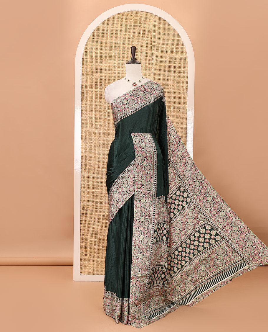 Green plain design Turkey crepe saree, intricately Ajrakh-printed border, pallu & matching blouse