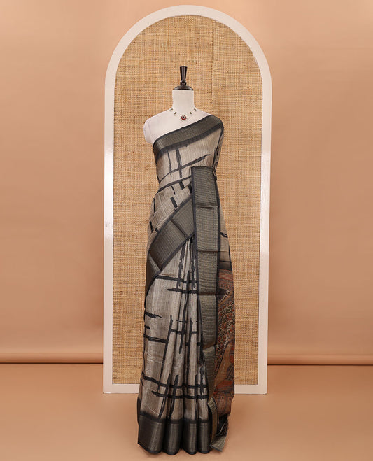 Chikku geometric printed semi-jute saree, contrast geometric zari border, Madhubani-style printed pallu, & black blouse of print & zari work