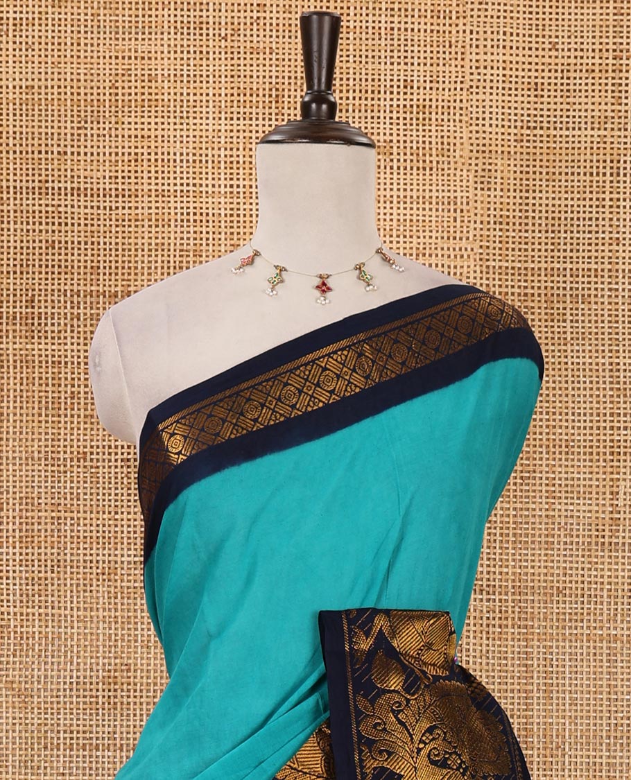 Blue plain sungudi cotton saree, contrast big annam motifs woven zari border, zari striped pallu & zari design blouse