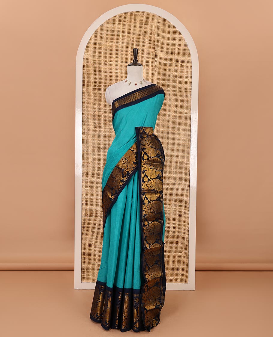 Blue plain sungudi cotton saree, contrast big annam motifs woven zari border, zari striped pallu & zari design blouse